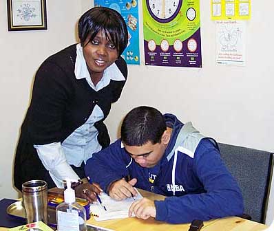 Woman working with man in Mary Centre Community Support Group