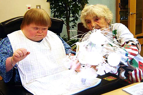 two woman in long term care having a chat