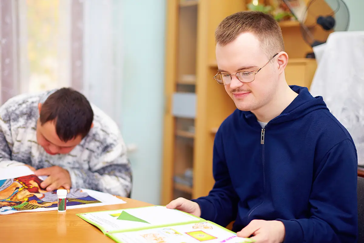 two young men studying together